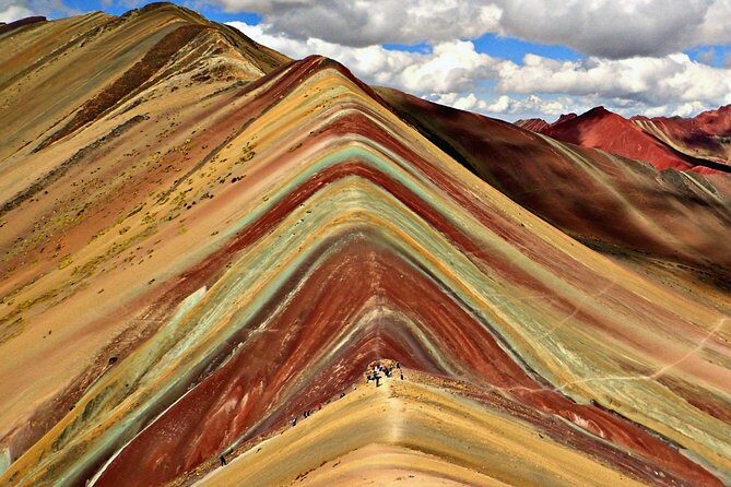Excursion to Rainbow Mountain From Cusco | Private Service | - The Hike Toward Vinicunca: Camelids, Ecosystems, and Ausangate Views