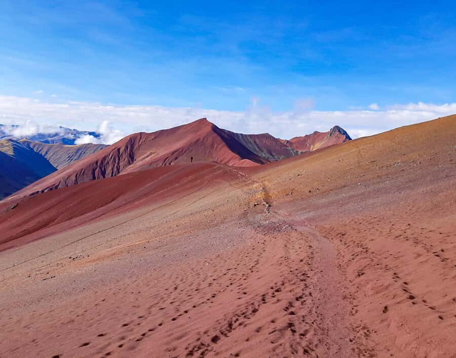 From Cusco: Full Day Rainbow Mountain + Red Valley | PRIVATE - Downhill retrace and the Cusipata lunch reset