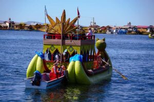 From Cusco: Titicaca Lake - Full day tour with sleeper bus - Uros floating islands: totora reeds, a family welcome, and optional reed-boat time