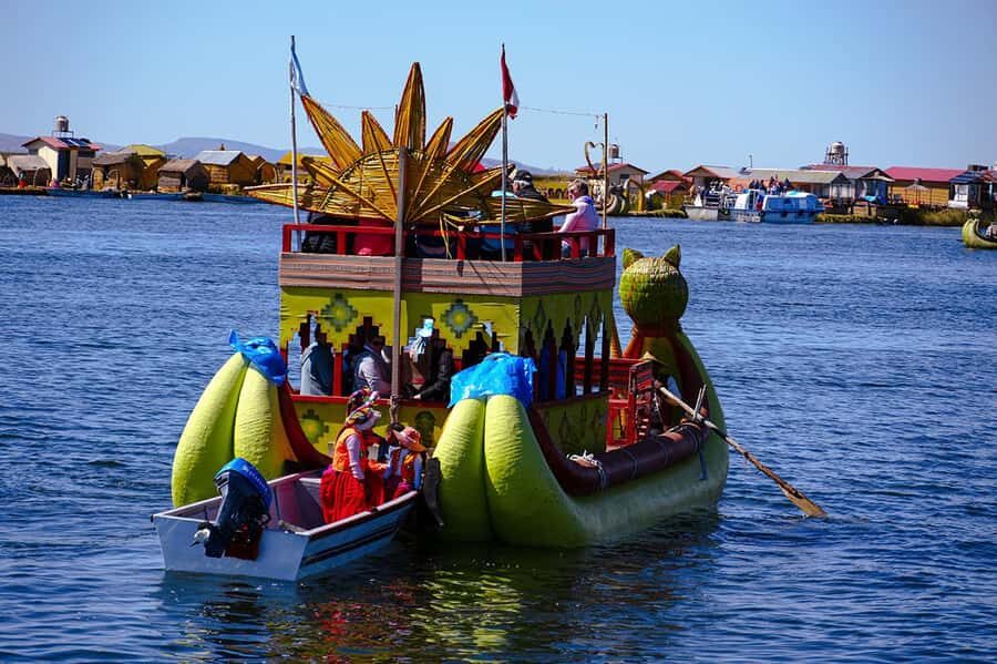 From Cusco: Titicaca Lake - Full day tour with sleeper bus - Uros floating islands: totora reeds, a family welcome, and optional reed-boat time