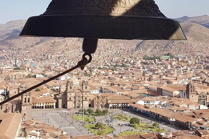 Open Bus Cusco City Tour - Paccha, the Great Mural, and the Inca-Spanish overlap you can see from the road