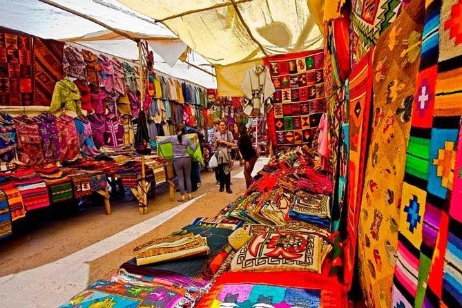 Sacred Valley VIP Tour with Maras and Moray from Cusco - Chinchero: Inca Foundations, Colonial Temple, and a Market With Teeth